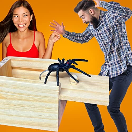 A man startled by a fake spider in a prank box while a woman laughs, adding to the comedic effect of the prank.