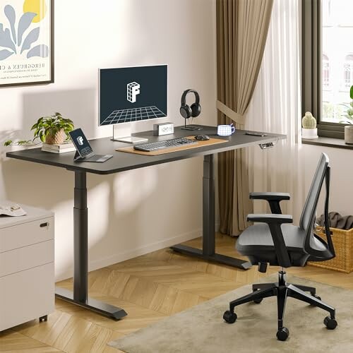 Modern home office with adjustable desk, computer, and chair.