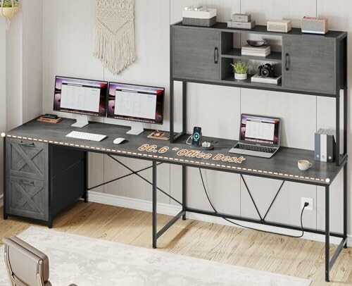 Modern office desk with dual monitors and storage shelves.