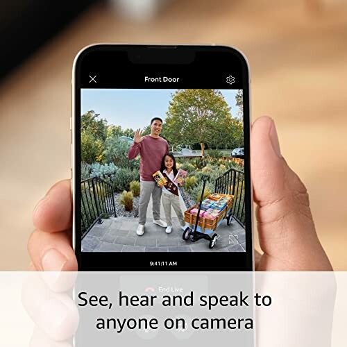 Person viewing live security camera footage on smartphone